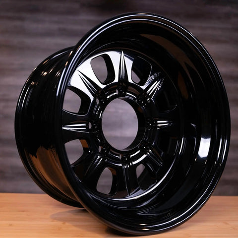 High Gloss Black Powder Coating For Automotive Wheels And Parts 1 Lb USA Made on a black car wheel with deep gloss finish