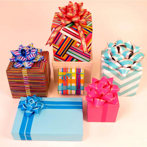 Gift boxes decorated with blurred lines washi tape and bows, showcasing Decorative Washi Tape for Planners and Crafts, Blurred Lines Pattern, 6-Roll Pack, 0.59 in x 393 in Each, Removable Adhesive for Journals, Gift Wrap, Labeling, DIY Projects.