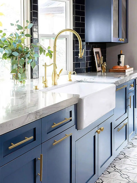 Modern kitchen with blue cabinets featuring 6 Inch T Shaped Bar Cabinet Pulls 8 Pack Stainless Steel Handles in gold finish.