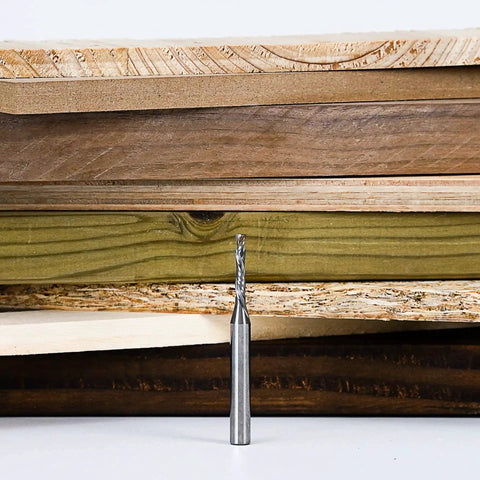 Up And Down Compression Spiral Router Bit For Woodworking And Engraving, One Eighth Inch Cutting Diameter, One Quarter Inch Shank shown with wood planks