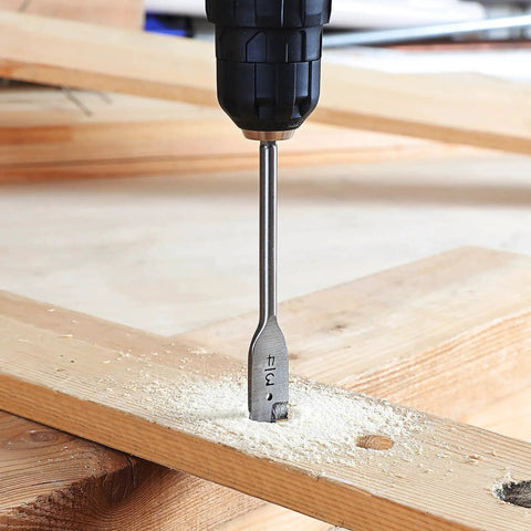 13 Piece Spade Drill Bit Set For Woodworking With SAE Sizes used in drill, close-up of bit drilling into wood