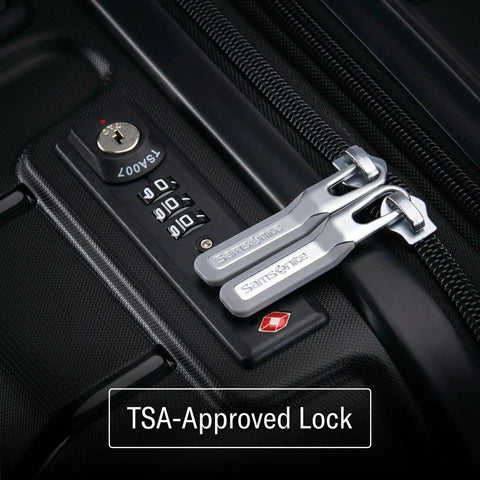 TSA-approved lock on Freeform Hardside Carry On Luggage With Spinner Wheels By Samsonite, close-up view of lock mechanism.