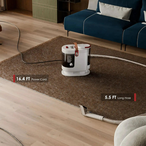 Portable Upholstery And Carpet Cleaner With 15KPa Suction And 500W Motor in living room on rug showing power cord and hose