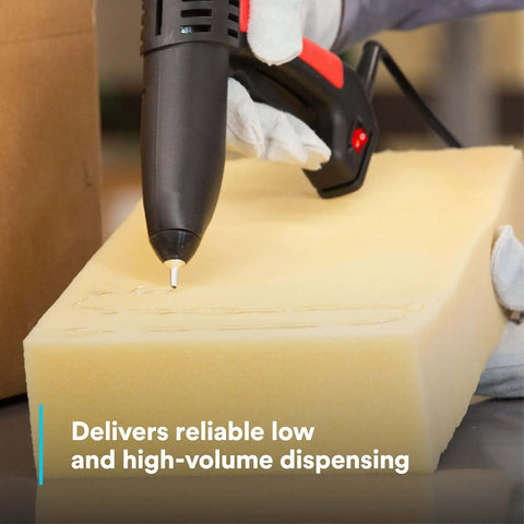 Single-unit industrial hot-melt applicator TC/TC-Q GEN II 120V in use, dispensing adhesive on foam