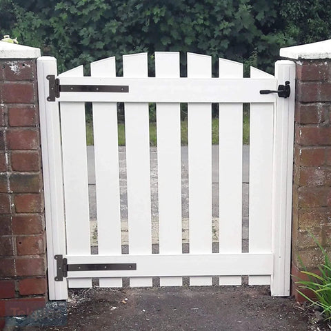 White gate with 24 Inch Black T Strap Gate Hinges Set, heavy duty iron, installed between brick pillars outdoors