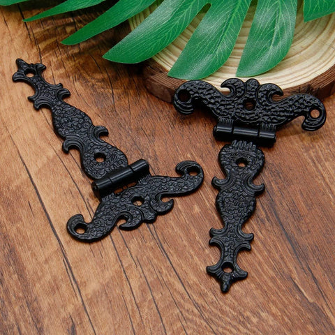 Tee Strap Hinge Set Heavy Duty Antique Black Hinges For Barn Doors and Gates on wooden surface, zinc alloy construction.