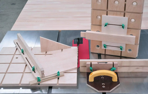 Matchfit Dovetail Clamp Pro Router Bit Kit With One Half Inch Shank And Fourteen Degree Bit For Precision Dovetail Routing In Woodworking Track System Includes Clamps Setup Gauge Hardware Pack And Manual shown in woodworking setup on table