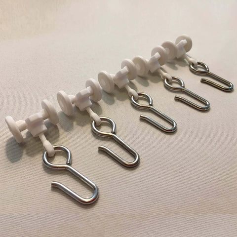Ceiling Curtain Track Gliders Set Pack Of 10 with plastic body and steel hooks on smooth rolling wheels for ceiling rails