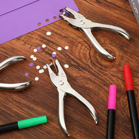 24 Pack Single Hole Punch One Quarter Inch Handheld Paper Punch For Circle Holes Metal Construction on desk with punched paper