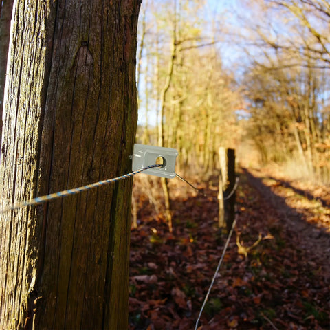 Installed ceramic lag screw fence insulator on wooden post with wire, 25 Pack Heavy Duty Ceramic Lag Screw Fence Insulators For Wood Posts