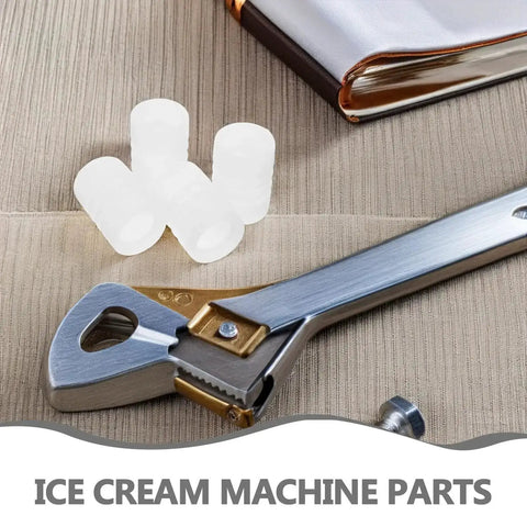 Silicone Sealing Gasket Set With Wave Sleeves, 4 Piece Replacement Kit For Ice Cream Makers, shown next to wrench.
