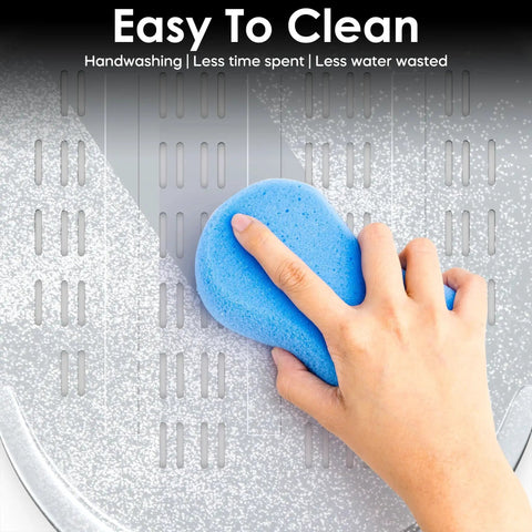 Close-up of hand cleaning a 12 Inch Aluminum Perforated Pizza Peel With Lightweight Slotted Design, Nonstick Surface, Hanging Hook.
