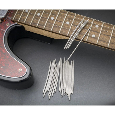 2.0mm Stainless Steel Fret Wire Set For Banjo And Vintage Fender Guitars 24 Piece Small Gauge on a guitar fretboard.