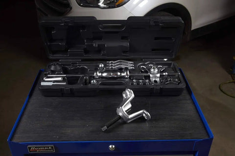 9 Way Slide Hammer Puller Set Heavy Duty Black Finish With Internal And External Jaws, tools displayed in open case on workbench