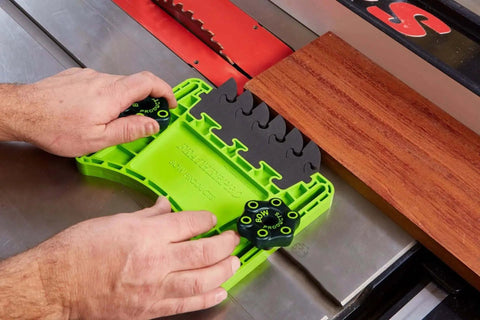 FeatherPRO FP1 Featherboard for table saws with EVA feathers reducing kickback, shown installed and guiding wood.