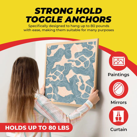 Person hanging a picture with Heavy Duty Drywall Anchors and Screws Kit for 80 lbs load, suitable for versatile home improvement.