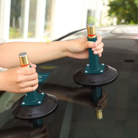 Hands using Six-Inch Vacuum Suction Cups With Metal Handle, Beefed-Up Heavy-Duty Handheld Lifting Cups on car windshield