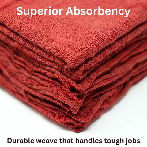 Close-up of folded red cotton shop towels showcasing texture and absorbency, part of 12 pack for garage and auto care.