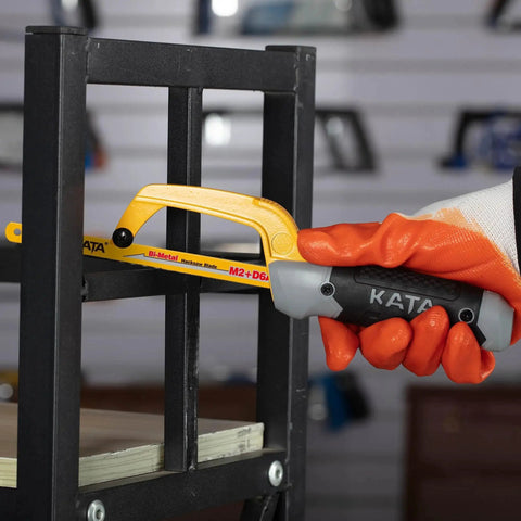 Person using Compact Mini Hacksaw For Metal Cutting With 10 Inch Aluminum Frame And Two Bi Metal HSS Blades for cutting metal pipe