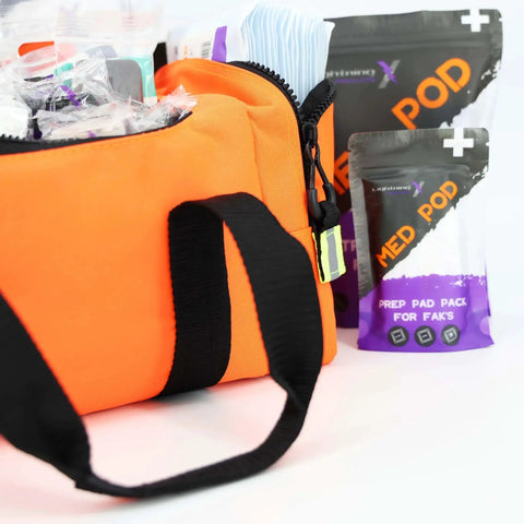 Value Compact Medic First Responder Trauma Bag With Basic Fill Kit for EMS and EMTs, orange stocked emergency medical bag with foam dividers.