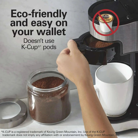 Hand using 2 Way Programmable Coffee Maker With Single Serve And 12 Cup Glass Carafe Black With Stainless Steel Accents Easy Scoop