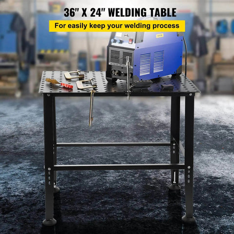 Beefy Heavy Duty Welding Table 36 By 24 Inches With 800 Lbs Capacity in workshop, tools and welding machine on top, carbon steel frame