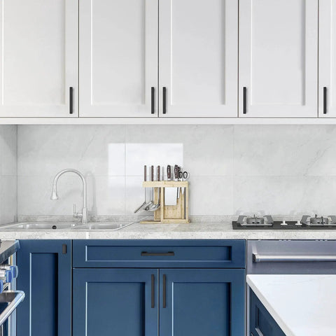 Modern kitchen with Matte Black Cabinet Knobs Set 10 Pack Durable Zinc Alloy Single Hole Cabinet Handles on white and blue cabinets