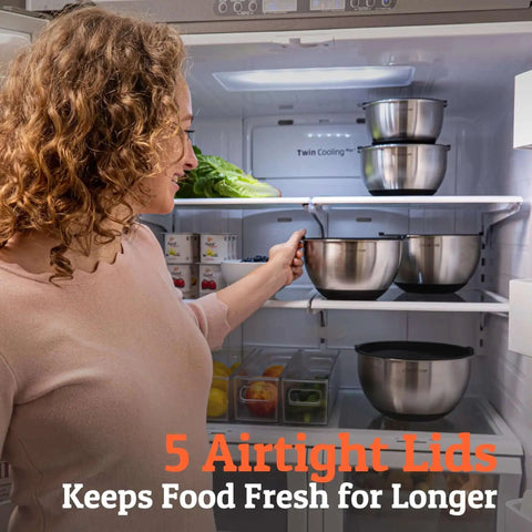 Woman placing Stainless Steel Mixing Bowls with Lids Set featuring airtight lids and non-slip base into fridge, five nesting bowls shown.