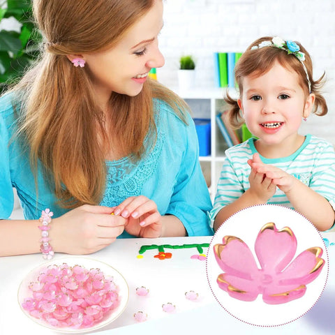 Mother and daughter using Pink Gradient Cherry Blossom Bead Set, 100 Pcs 5-Petal Acrylic Flower Beads for bracelet making.