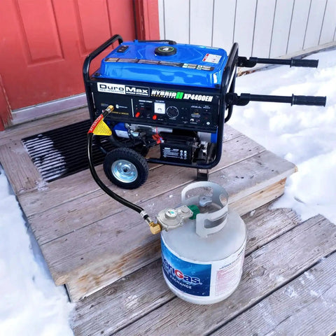 Ready to Hook Up 3ft Two Stage Propane Regulator Hose With 90 Degree Fittings connected to a dual fuel generator outdoors