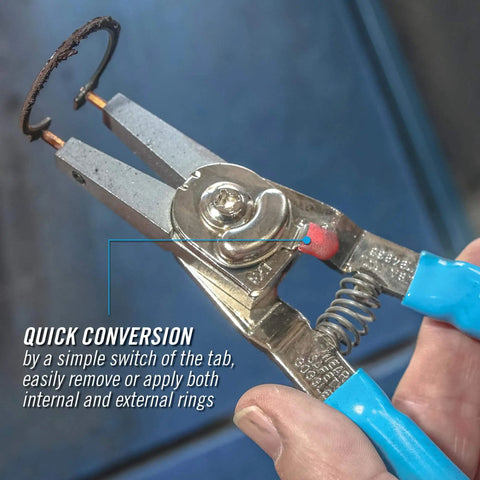 Snap Ring Pliers 927 Pro Grade For Internal And External Circlips Five Tip Set shown in use with blue grips.