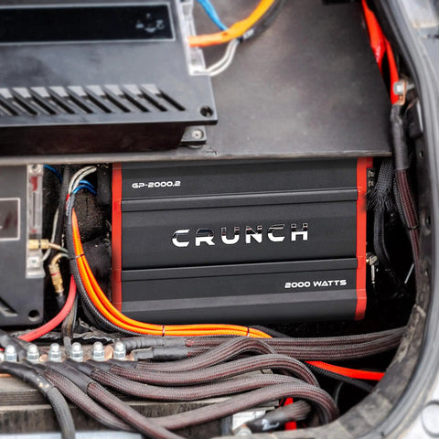GP2000 2000W 2 Channel Car Amplifier With Beefy Bridged Mono 4 Ohms installed in vehicle with visible wiring