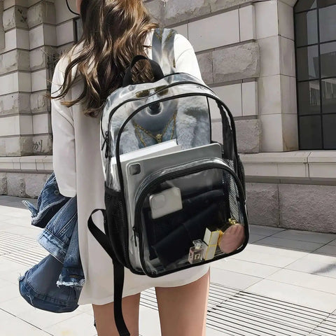 Woman carrying Clear PVC Backpack See Through Bookbag With Front Mesh Pocket And Side Bottle Pockets 12L