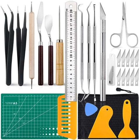 28 Piece Precision Craft Tools Set For Vinyl Weeding And DIY Art Projects Including Tweezers Spatulas Weeders Scissors Knife Cutting Board Blades Tracing Pen Ruler Carving Knife And More In A5 Zipper Bag For Scrapbooking And Hobbyist Projects visible on a table.