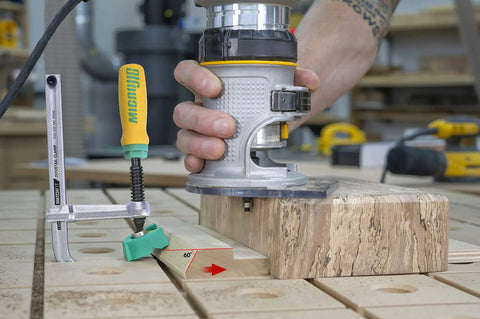 Matchfit Dovetail Clamps DVC 538K2 With X Pad Set installed for routing on wooden jig with handheld power tool