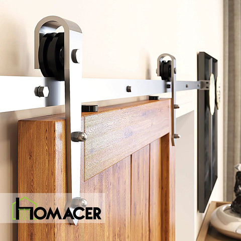 Close-up of Beefy Brushed Nickel Non-Bypass Sliding Barn Door Hardware Kit installed on wood door with 8 ft track.