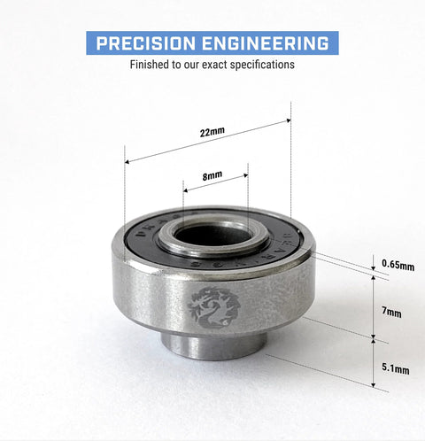 Ceramic skateboard bearing with dragon logo on silver housing; 22mm outer diameter, 8mm bore