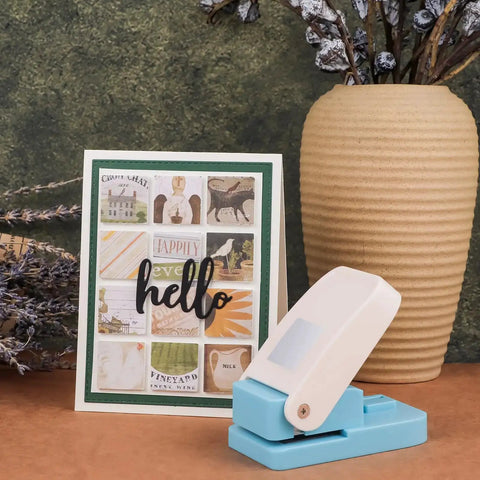 1 Inch Square Hole Punch For Crafting And Scrapbooking next to a card with square embellishments, lever paper punch for DIY projects