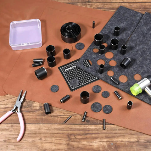 Leather Circle Cutter Tool Set With 31 Piece Circle Punches from 1mm to 55mm displayed with cutting board and leather material