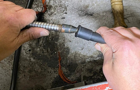 Parts Brush Oriflo with Hose OR101H; metal braided hose connected to black plastic washer nozzle.