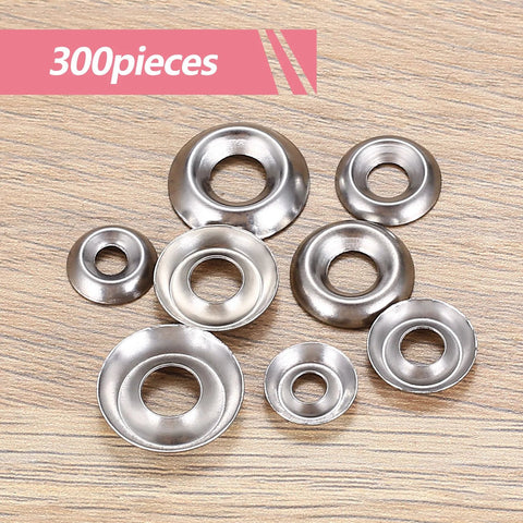 Assorted stainless steel cup countersunk finish washers, various sizes, 9 pcs on a wood surface
