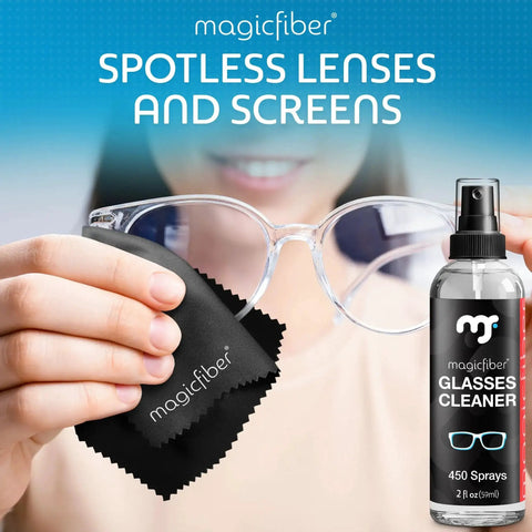 Person cleaning glasses with Glasses Cleaner Kit With Two Sprays And Two Microfiber Cloths For Lenses Screens