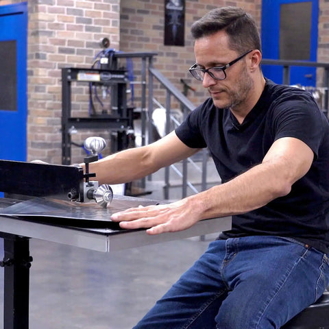 Person using Bead Roller Knob Kit For Eastwood 19 Inch Bead Roller Ergonomic Pro Grade Billet Aluminum for metal fabrication