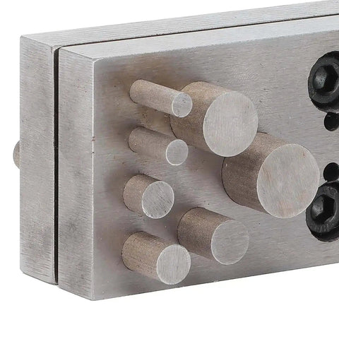 Close-up of Disc Cutter Punch Set 14Pcs for Jewelry Making and Metal Gasket Punching showing flat bottom die cutter with five hole sizes.
