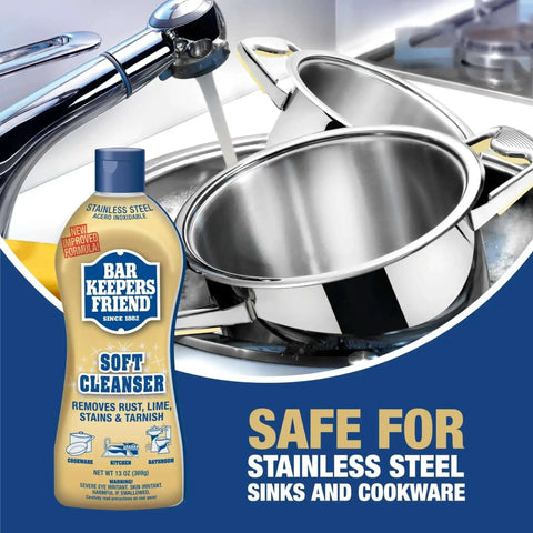 Soft Cleanser Liquid 2 Pack 13 Oz Bottles Multipurpose Cleaner and Rust Stain Remover for Stainless Steel Porcelain Ceramic Tile and More Tackle Grime Fast in Kitchen and Bath with stainless steel sink and cookware in background.