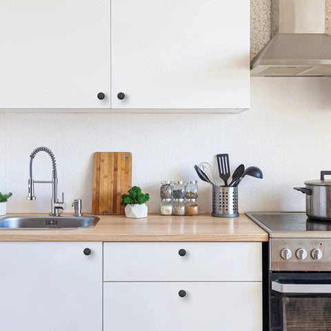 Ten Pack One And One Quarter Inch Matte Black Round Cabinet Knobs Zinc Solid Drawer Pulls For Cabinets Cupboards Dresser Closet And Bathroom Modern Hardware For Kitchen And Furniture Durable Rust Resistant installed on white kitchen cabinets