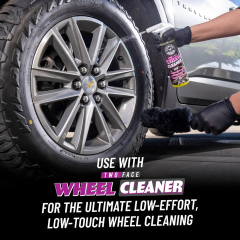Soft Natural Bristle Wheel And Rim Cleaning Brush With Gerbil Hair For Wheels Rims Exhaust Tips And Delicate Surfaces Safe Brake Dust Removal shown cleaning a car tire