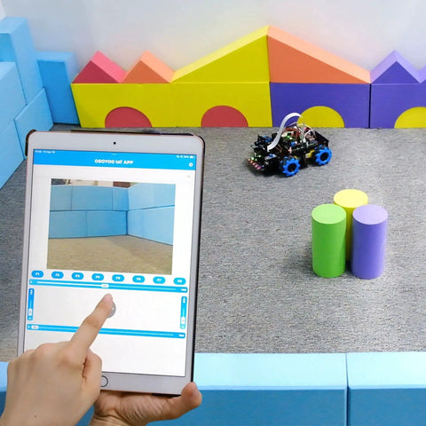 Tablet controlling Omni Directional Mecanum Wheel Robot Car Kit For Raspberry Pi 3 4 5 with colorful blocks in background