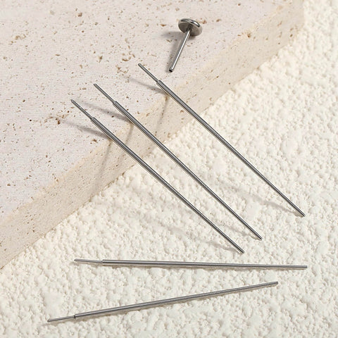 Six Pack 20G Piercing Taper Insertion Tool Set For Flat Back Earrings shown on a textured surface, highlighting stainless steel material and precise tips.