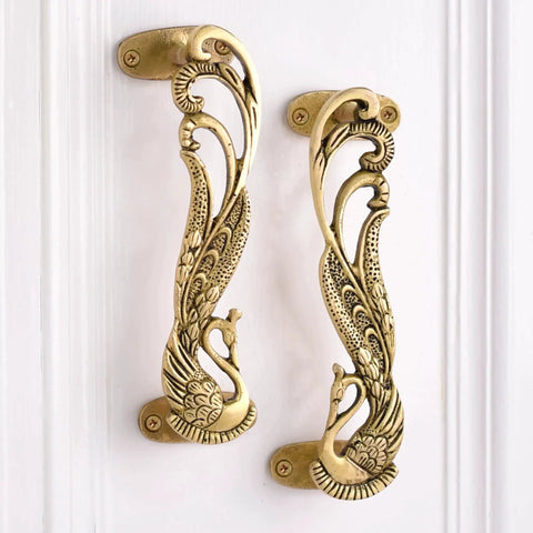 Peacock Inspired Decorative Door Handles Set One Pair for Interior Doors and Cabinets Vintage Style Pulls in Antique Brass Gold Finish 7.4 Inches Long Solid Brass Durable Rust Free Hardware for Homes and Offices.